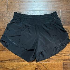 Lululemon black size 4 high rise hotty hot shorts 2.5” inseam